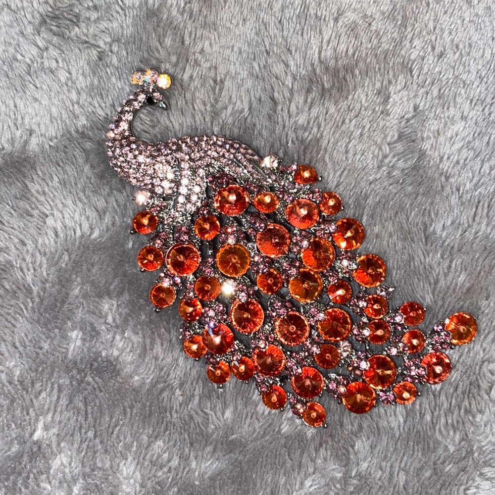 Red and pink crystal peacock brooch